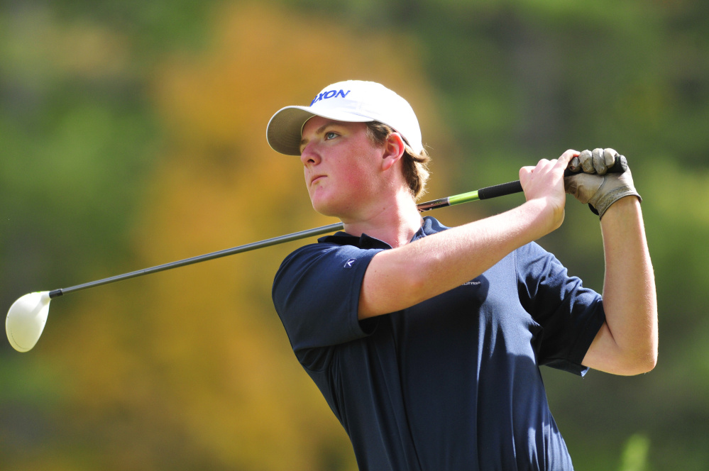 Joe Phelan/Kennebec Journal
Yarmouth golfer Mac Leahy tees off on 17th hole during state team golf championship on Saturday at Natanis Golf Course in Vassalboro.