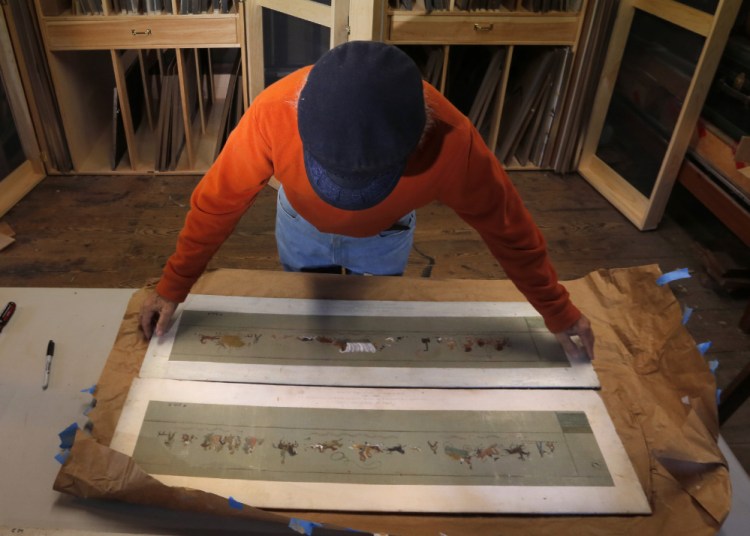 Charlie Ipcar with a mural study created by his mother, Dahlov Ipcar, in the 1939. <em>Gregory Rec/Staff Photographer</em>