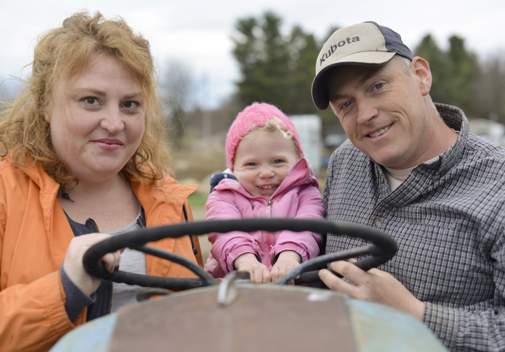 Jerry Ireland, right, with his daughter Aana Grace Ireland, 3, and his wife, Emily Ireland.