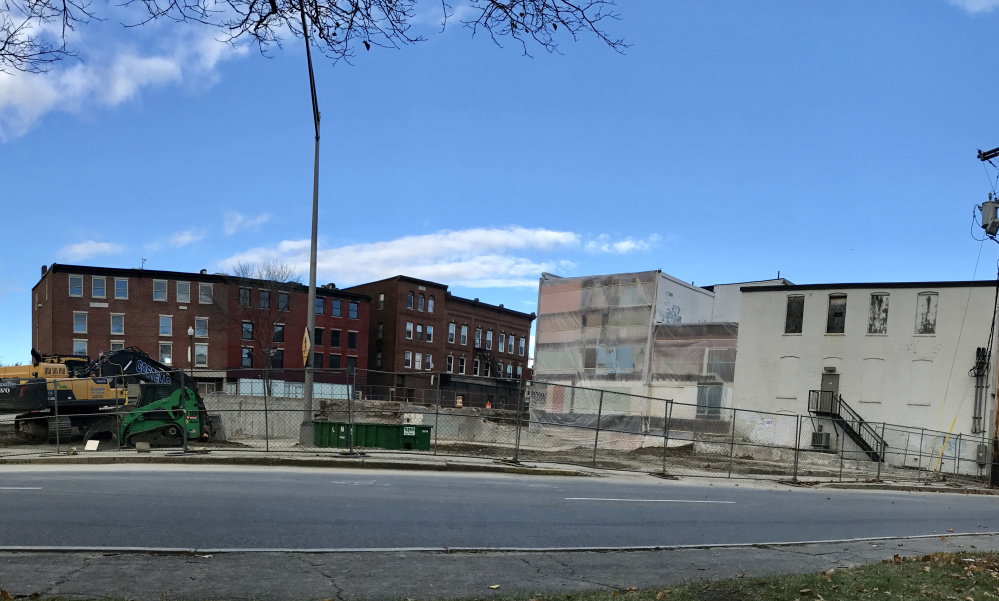 The former Levine's building, seen before demolition, in downtown Waterville has been largely torn down.