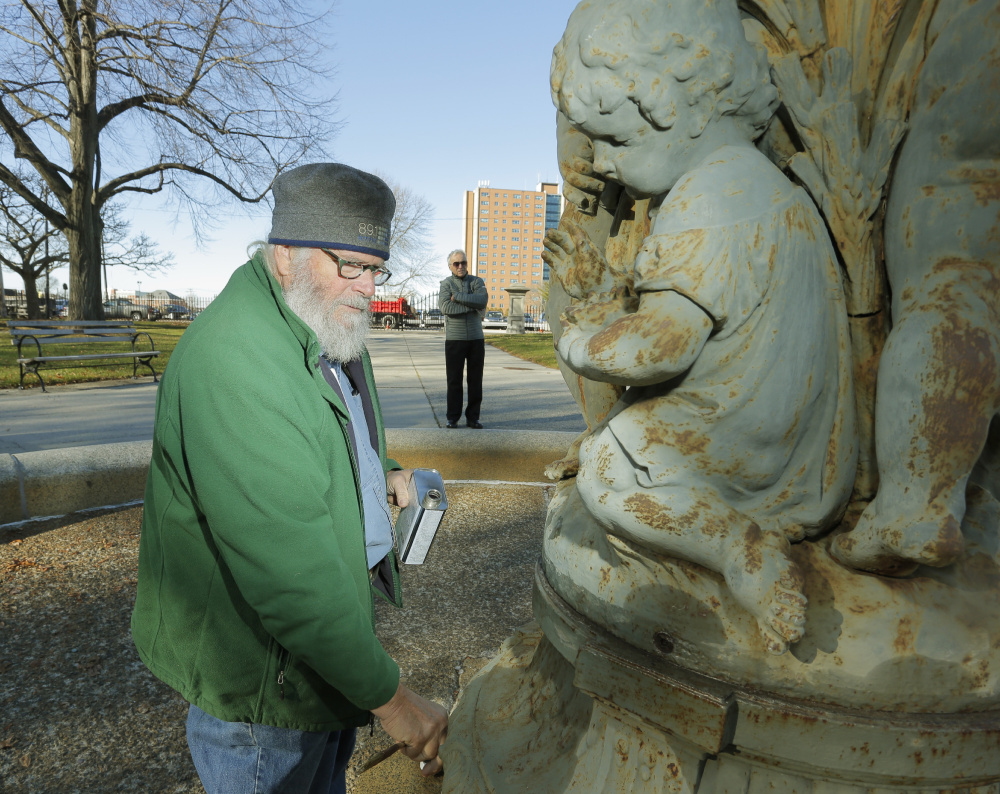 Jonathan Taggart says that after he removes rust and paint, then applies a new finish, Lincoln Park will have a deep-green fountain that will look as good as can be expected for a 145-year-old piece of iron.