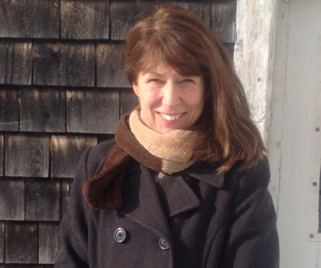 Ellen Taylor, a professor of English at the University of Maine, in a coat, scarf and jeans that were Goodwill finds.