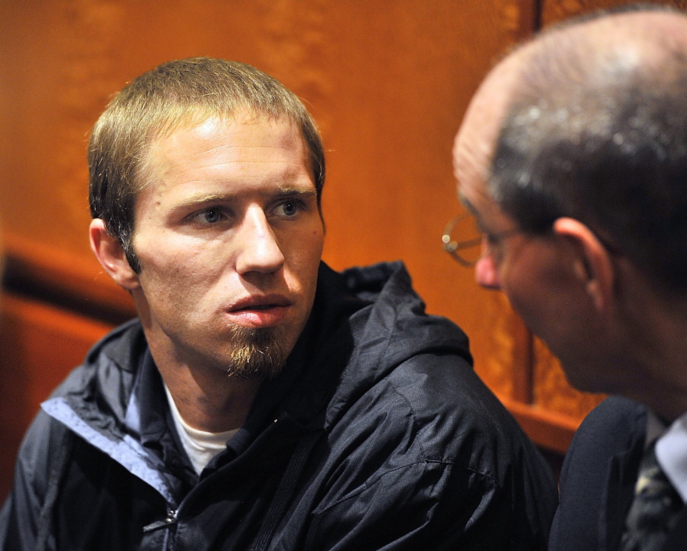 Justin DiPietro, father to Trista Reynolds' daughter, Ayla, who is missing and presumed dead, talks to his attorney, Gerard Conley Jr., on Sept. 25, 2013, prior to appearing before the judge in court on an assault charge that was reduced via plea bargain to a lesser charge.