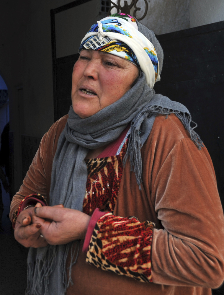 Associated Press/Anis Ben Salah Nour El Houda Hassani, the mother of Anis Amri, reacts after the death of her son, in Oueslatia, central Tunisia, on Friday. Amri was shot dead early Friday in the outskirts of Milan, Italy.