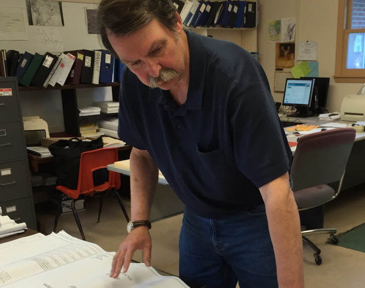 Bill Butler, the code enforcement officer for the town of Chelsea, reviews the plans for the Cabin in the Woods project for homeless veterans.
Kennebec Journal/Jessica Lowell