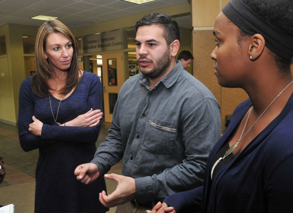 From left, University of Maine Farmington students Melissa Sawyer-Boulette, Ronie Moralis and Rhiannan Jackson helped write a successful grant proposal that will enable a homeless shelter to maintain its day program for residents.