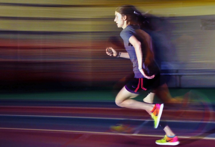 Juliana Selser of South Portland has found herself alone on the track, seeking greater competition in the 800. She's seeking to drop her time enough to qualify for the nationals.