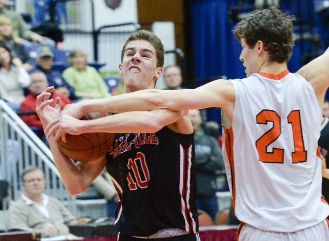 NYA's Jake Malcom, right, gets his hand on the ball as Hall-Dale's Alec Byron goes up for a shot during the first quarter of a Class C South quarterfinal Monday at the Augusta Civic Center. Malcom scored 25 points and hit the go-ahead 3-pointer as the Panthers rallied to a 59-55 win.