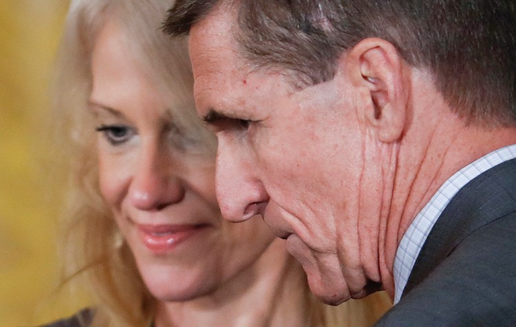 National Security Adviser Michael Flynn and Counselor to the President Kellyanne Conway take their seats before the start of a joint news conference with President Donald Trump and Canadian Prime Minister Justin Trudeau in the East Room of the White House Monday.