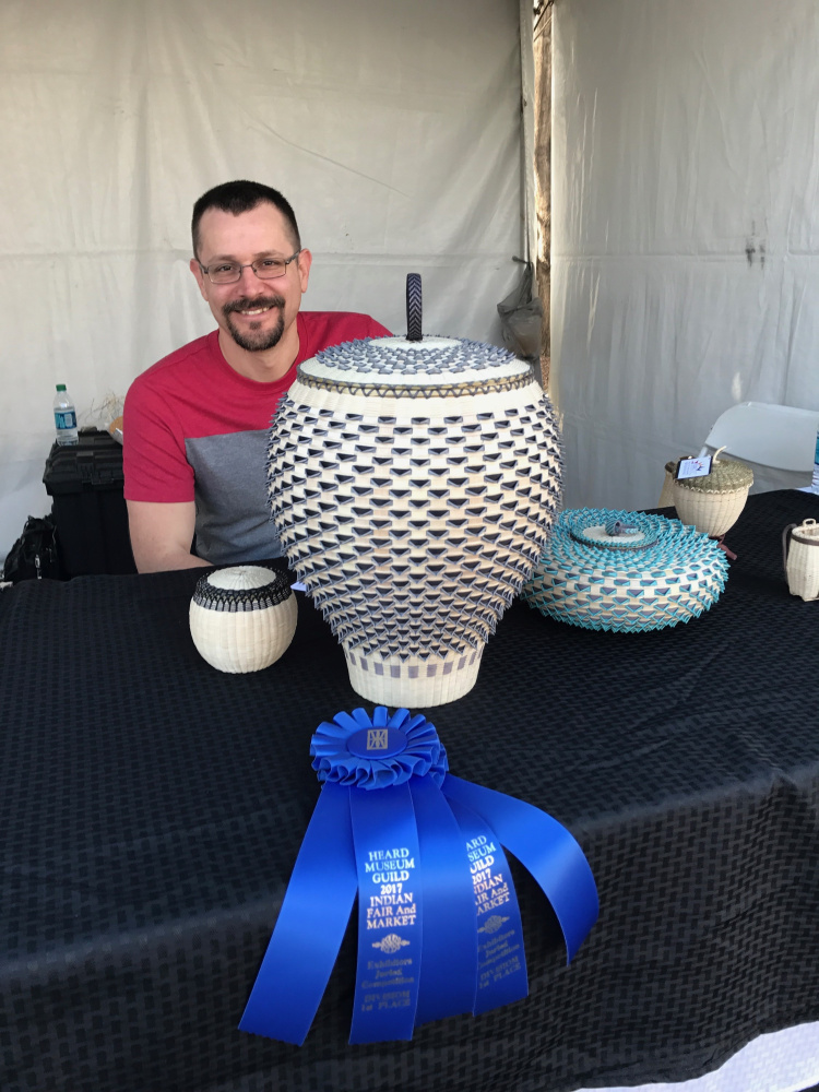 Jeremy Frey and his award-winning basket.
Photo courtesy of Abbe Museum