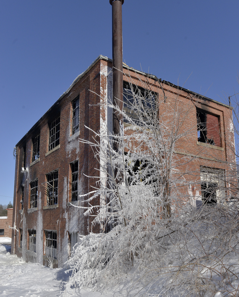 A fire Wednesday night gutted this three-story brick building in a mill complex at 3 Mallison Falls Road in Windham. The complex is still under contract to be sold.