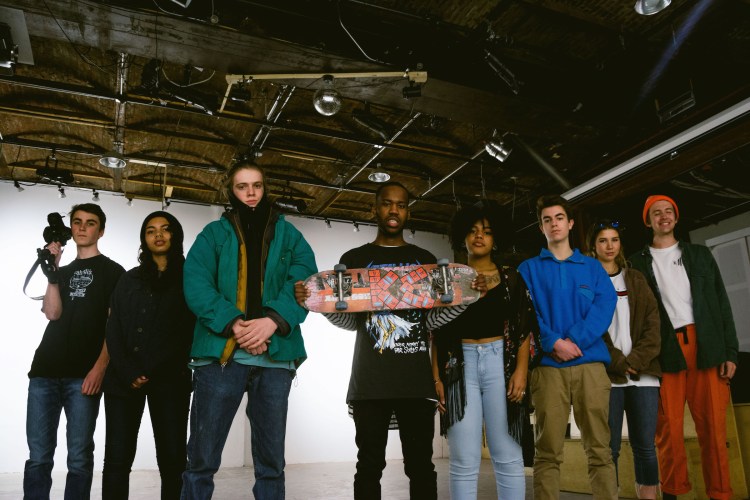 Artists and members of the Kesho Wazo collective take a break during a meeting at Space Gallery last week. From left: Henry Spritz, Mahalia Judge, Julian Abbott, David Thete, Candice Gosta, Owen Hoffsten, Ambrosia Klenda and Dylan Greenlaw. Judge and Gosta are students at the Maine College of Art. Klenda is a UMaine student; Greenlaw attends Baxter Academy; and Spritz, Abbott and Hoffsten go to Waynflete. (Photo by Dylan Greenlaw) 