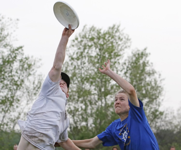 Eli Babcock, left, and his Cape Elizabeth teammates will try to dethrone Dex Dremann, right, and the Falmouth Yachtsmen at the Ultimate state championships Saturday in New Gloucester.