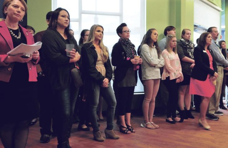 Thomas College students and staff members listen to speakers Wednesday after an announcement that Thomas College would receive $5.3 million from the Harold Alfond Foundation for the new Harold Alfond Institute of Business Innovation at the Waterville college.