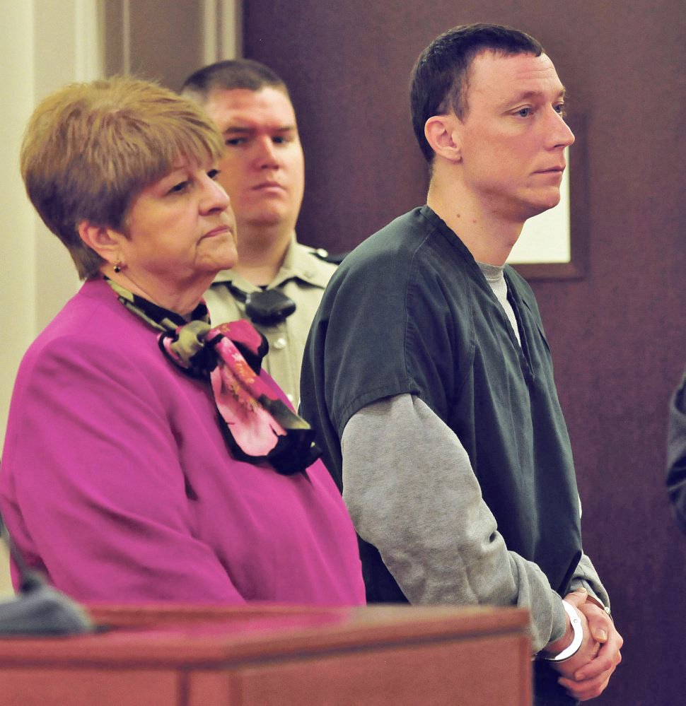 Defendant Mark D. Halle answers questions from Justice William Stokes during Monday's sentencing hearing. Beside Halle is his attorney Pamela Ames. 