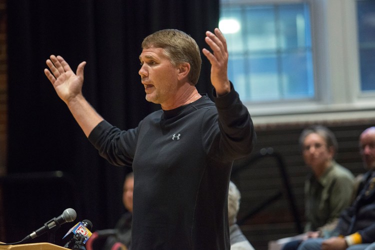 Randy Small of York, at a hearing in Kittery on Monday, speaks against the Maine Turnpike Authority's proposal to build an upgraded toll plaza.