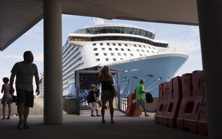 Passengers walk near Anthem of the Seas when it was docked at the Ocean Gateway International Marine Terminal in Portland last year.