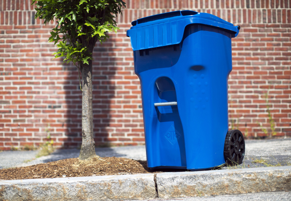 The city of Portland rolls out new recycling containers. Literally. This example of the new bins is on display at the Public Service Department, at 55 Portland St.