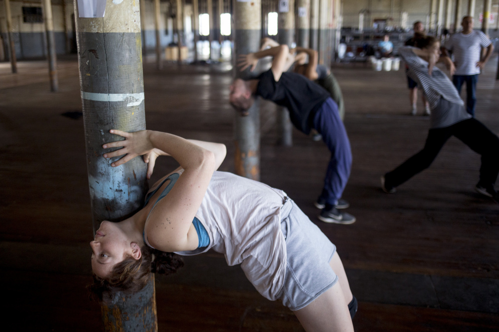 Staff photo by Brianna Soukup
Dancers rehearse last month for the multimedia production "Mill Town" in Lewiston's Bates Mill Complex.