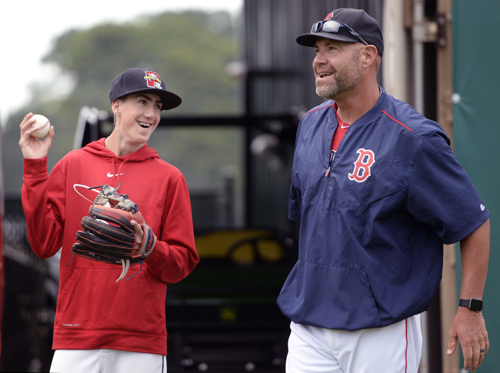 Two peas in a pod, said Anne Epperson of her son and husband. Drew Epperson, left, who has had 22 surgeries in 18 years, is best friends with his dad, Chad, a Red Sox minor league instructor.