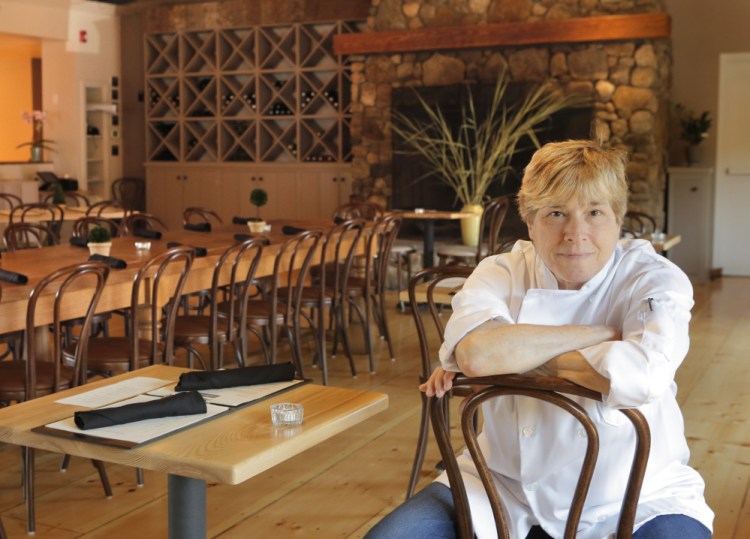 Rebecca Charles in the dining room of her restaurant, Pearl Kennebunk Beach, which opened Aug. 5.