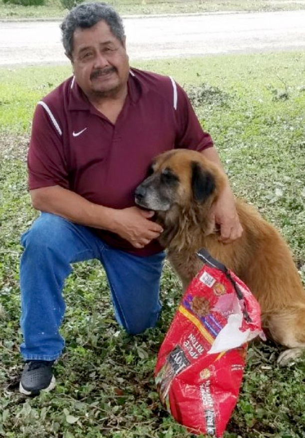 Salvador Segovia and Otis with the scavenged food.