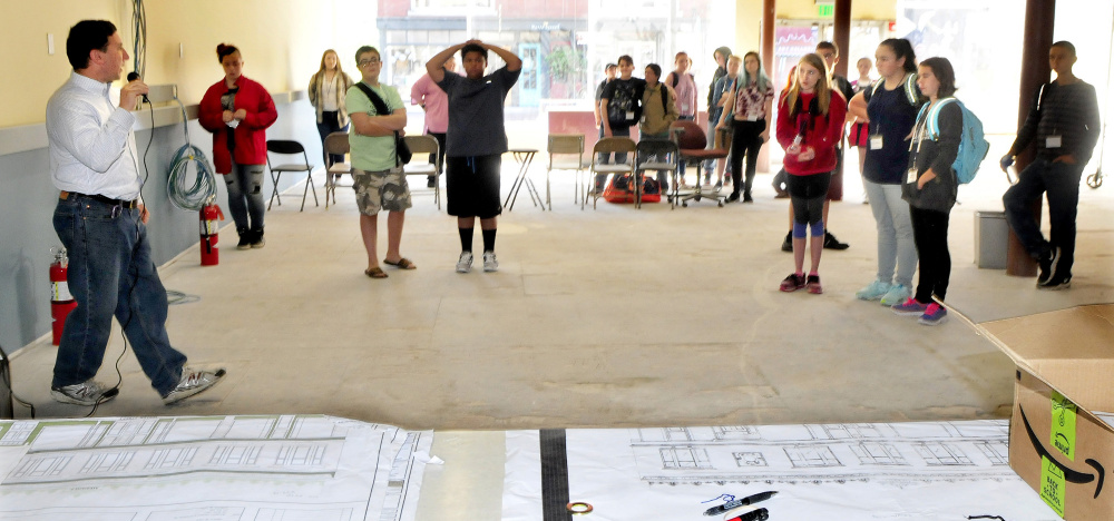 Engineer and building designer Steve Govoni speaks with Cornville Regional Charter School students at the downtown Skowhegan school site on Monday. They will learn about the design process and provide input to Govoni and the contractors working on the renovation of their school.