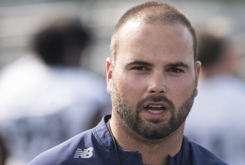 UMaine football head coach Joe Harasymiak directs his team during practice with the UMaine Black Bears football team on Wednesday at Morse Field on the Orono campus.
Photo by Kevin Bennett