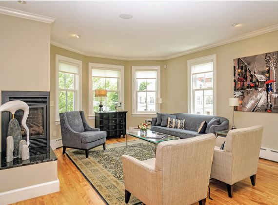 The living room, with corner gas fireplace. 