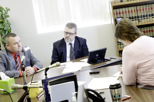 Auburn Police Detective Nicholas Gagnon, left, answers a question from attorney Adam Sherman during a hearing in Lewiston about Taneisha Thomas. Susan Cole, assistant director of the Bureau of Motor Vehicles, right, found that Gagnon did have probable cause to stop Thomas, who was represented by Sherman, on Aug. 13 in Auburn. 