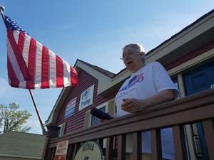 Susan Reitman at her home on Seavey Lane. Reitman moved her pro-Trump signs from the gate of her driveway to her house.