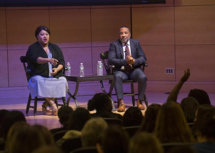 Veronica Robinson and  Alfred Carter, both grandchildren of Henrietta Lacks, field questions from the audience at University of Southern Maine's Hannaford Hall on Friday.