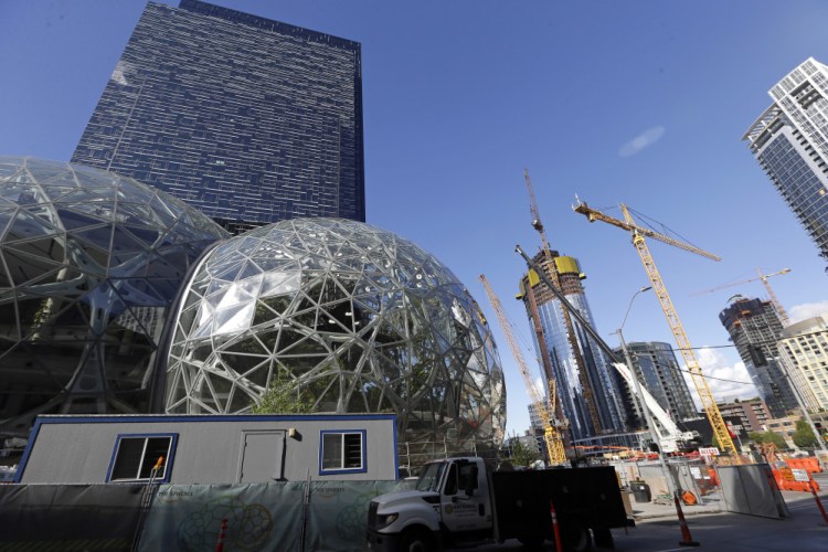 For years now, much of downtown Seattle has been a maze of broken streets and caution-taped sidewalks, with dozens of cranes towering overhead as construction trucks rumble past.