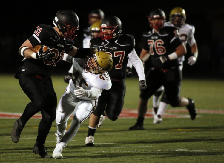 Owen Garrard, left, has been the workhorse in the backfield this season for Scarborough, rushing for 1,119 yards and scoring 20 touchdowns. But this is a senior-laden team that has learned the benefit of a diversified offense while winning the Class A South title.