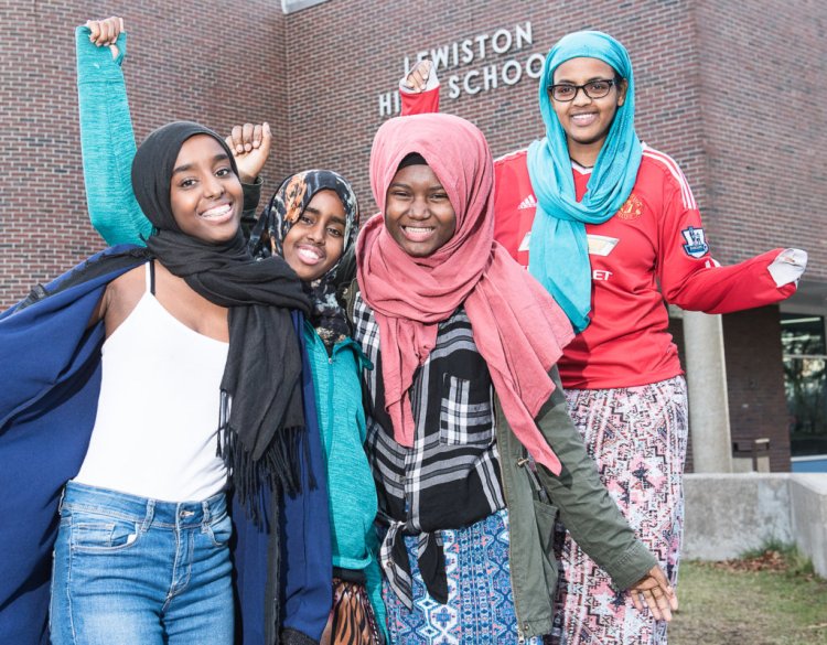 A group of Lewiston High School students working to reduce the number of student detentions and create more teaching moments has won a $113,000 grant to create a new position at the school. Members of the group celebrating at the school Wednesday are, from left, Bisharo Odowa, Amino Aden, Fadimatou Katou and Fardowsa Aden.