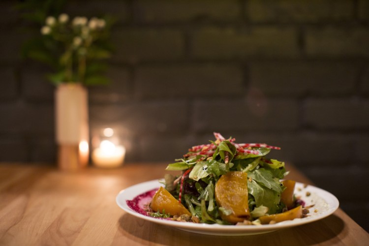 Beets Three Ways (roasted, pickled and raw), with tarragon-infused yogurt and spiced pistachios.