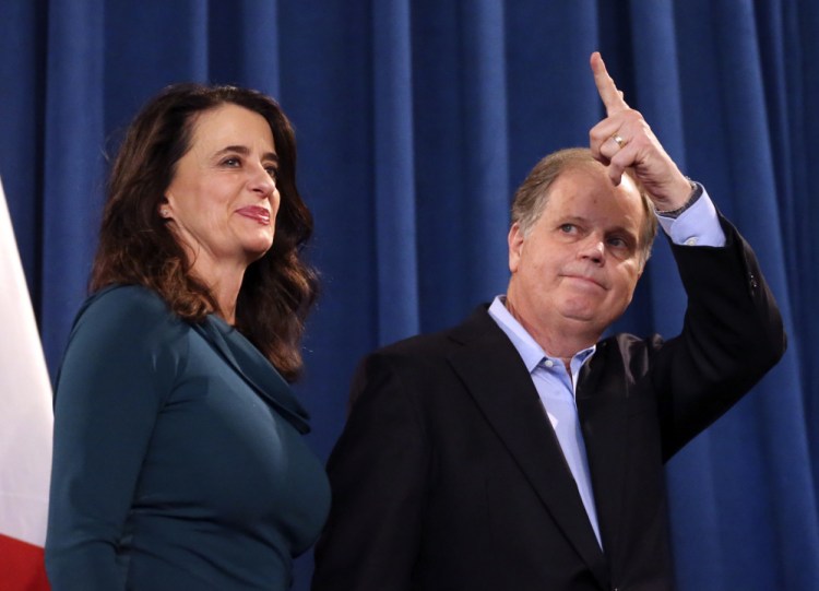 The victory of Democrat Doug Jones, above, over fireband Republican Roy Moore buoys Democrats' hopes of retaking the Senate in 2018.
