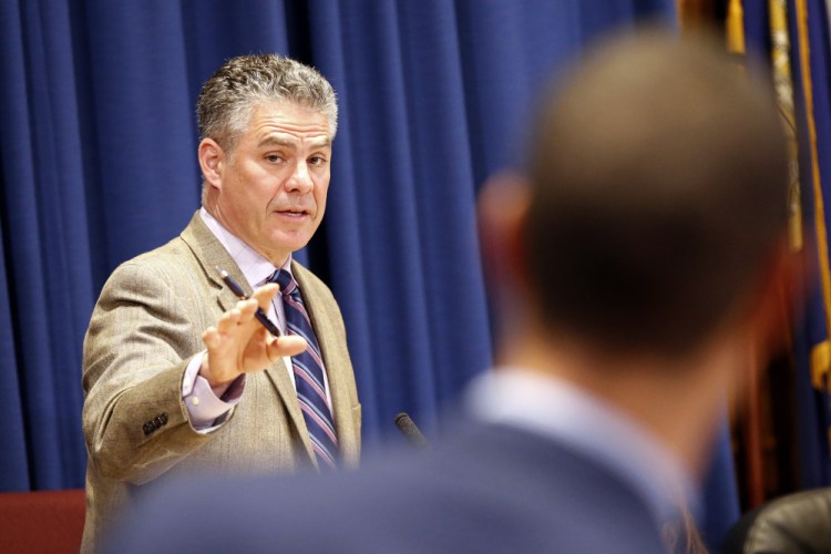 Portland Mayor Ethan Strimling and Councilor Spencer Thibodeau speak at Monday night's City Council meeting. The council rejected a plan in which Strimling would have become the chair of the council's Finance Committee.