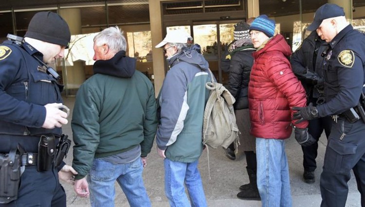 Police on Jan. 29 arrested protesters from the group Speak the Truth to CMP at Central Maine Power in Augusta.