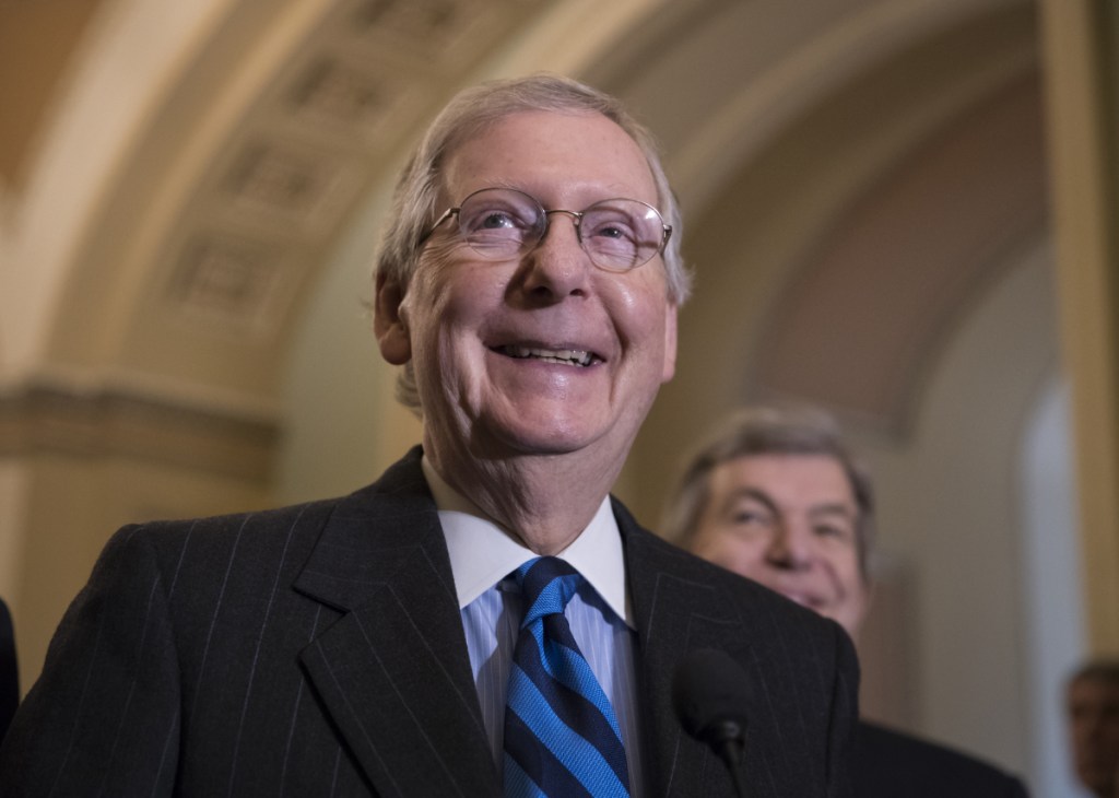 Senate Majority Leader Mitch McConnell, R-Kentucky, meets with reporters Tuesday as Senate leaders work on a budget deal that was announced Wednesday.