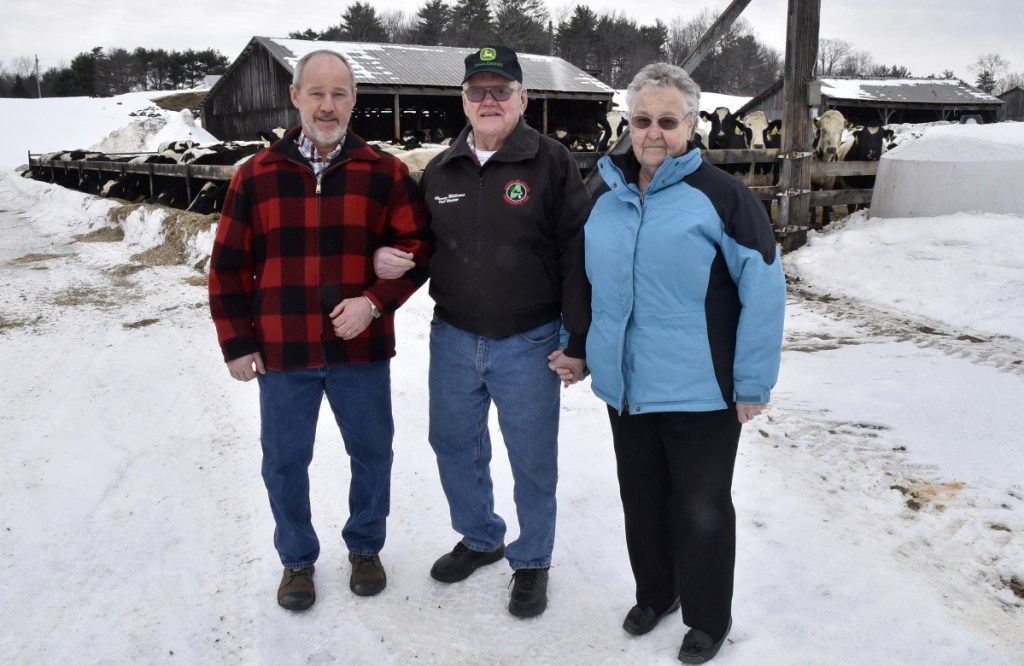 The Anson Board of Selectmen dedicated its annual report to the Williams family. From left are Richard Williams with his parents, Harvey and Jean.