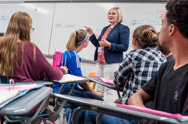 Lewiston High School math teacher Samantha Garnett Sias, shown in her class in September, advocates a three-pronged approach to preventing school shootings that does not include arming teachers. "First, increase restrictions on (guns), namely assault rifles," she said.