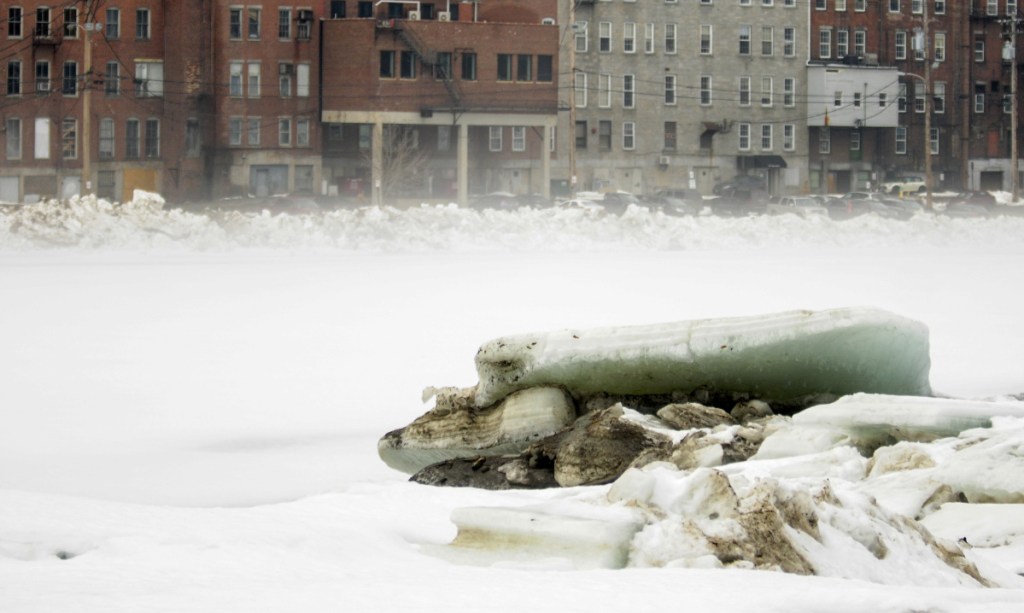 Large chunks of ice line the sides of Kennebec River on Wednesday at the East Side Boat Launch in Augusta. The National Weather Service said Wednesday that melting is occurring at a gradual pace that reduces the risk of flooding.