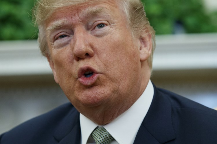 President Trump talks with reporters during a meeting with Irish Prime Minister Leo Varadkar in the Oval Office of the White House on Thursday in Washington.