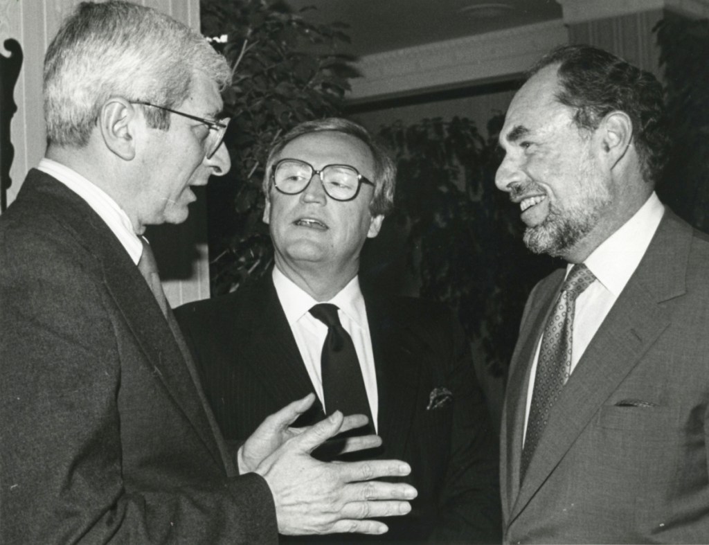 Lawrence Grossman, right, meets with NBC's Marvin Kalb, left, and Robert McFarland in 1987.