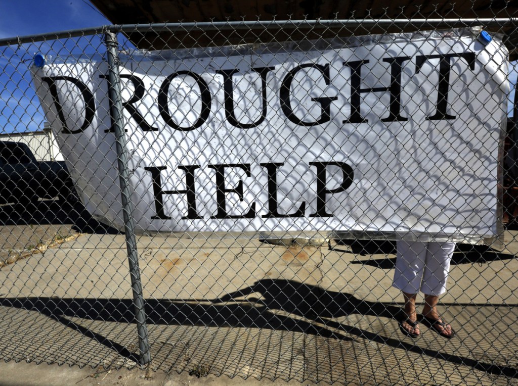 At the PACC Water Resource Center in 2016, Porterville, Calif., residents could either get bottled water for free or pump water into multigallon totes to bring home.