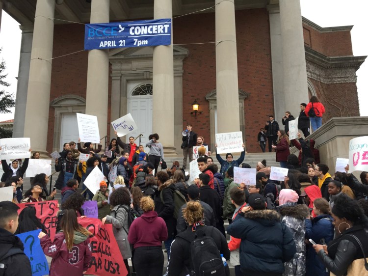 Syracuse University students gather outside Hendricks Chapel on Wednesday to protest a video made by members of Theta Tau fraternity.