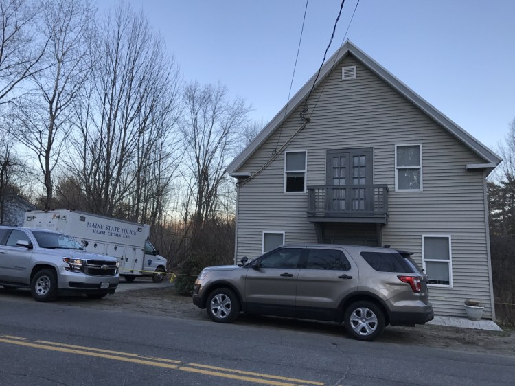 The Maine State Police Major Crimes Unit truck is parked outside of 1482 Hallowell Road in Litchfield on Sunday. 