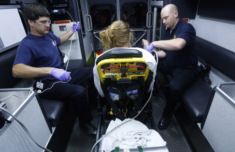 A woman is taken to Maine Med after Portland paramedics used naloxone to reverse an overdose in 2015. Overdose patients at Mid Coast Hospital in Brunswick get Suboxone in the ER, then a referral to long-term treatment.