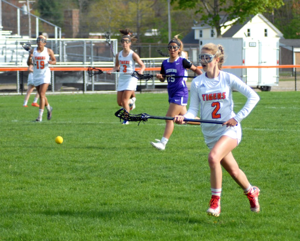 Biddeford junior Paige Laverriere chases down a loose ball during Wednesday's game against Deering at Waterhouse Field in Biddeford.